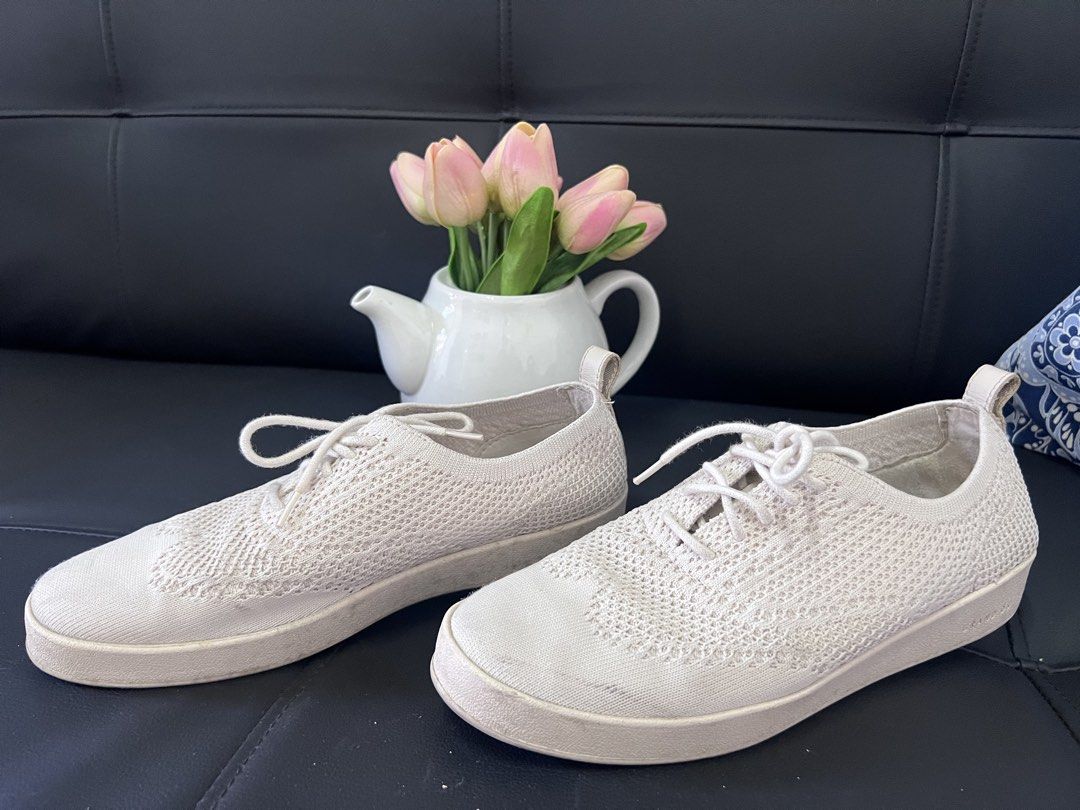 Cole Haan Knit Sneakers Us 7b (Category: Sneakers) located in Manila. Submitted by nuttshellw52293 (Listing ID 1468107854, Image 2). Description: - Brand: Cole Haan - Style: Knit sneakers / casual walking shoes - Color: Off-white / cream - Size: US 7B - Closure: Lace-up with textured knit upper - Condition: Good everyday condition with moderate tread wear on soles and slight scuff marks on the front toes - Perfect for daily commuting, errands, an