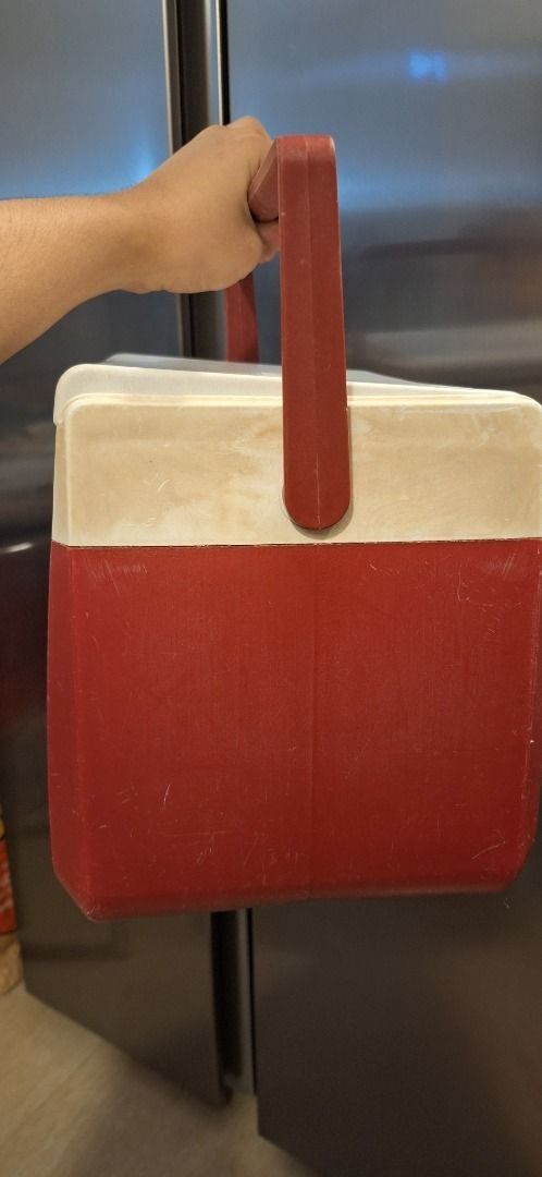 COLEMAN Cooler (Category: Food Organization & Storage) located in General Trias. Submitted by aeunice (Listing ID 1468193682, Image 3). Description: Brand: Coleman Color: Red Size: 13L In Good Condition. It has a handle for easy carrying. The cooler's interior is clean and spacious. Made by Coleman Co., Inc. in Wichita, Kansas, USA. Meet up / Shipping via Lalamove, JnT, Gogo Express & LBC..