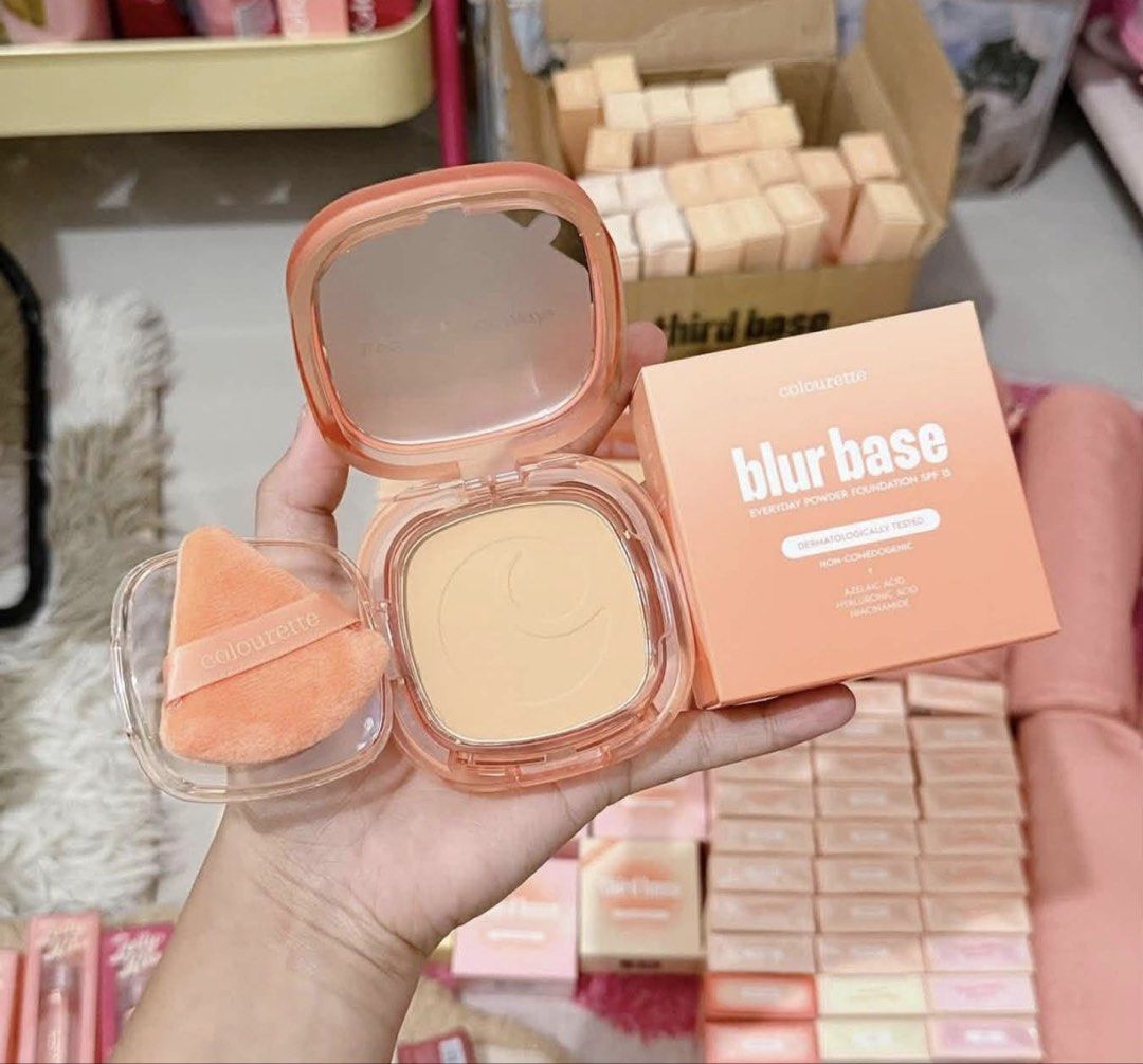 Colourette Blur Base Everyday Powder Foundation (Category: Makeup) located in Manila. Submitted by silentstone_fc1237 (Listing ID 1468209430, Image 1). Description: - Brand: Colourette - Product: Blur Base Powder Foundation (Peach packaging) - Condition: Brand new, unopened with full box - Protection: SPF 15 Shades Available: Donsol Mati Lazi - Key Ingredients: Azelaic acid, hyaluronic acid, and niacinamide - Formula: Dermatologically tested and 