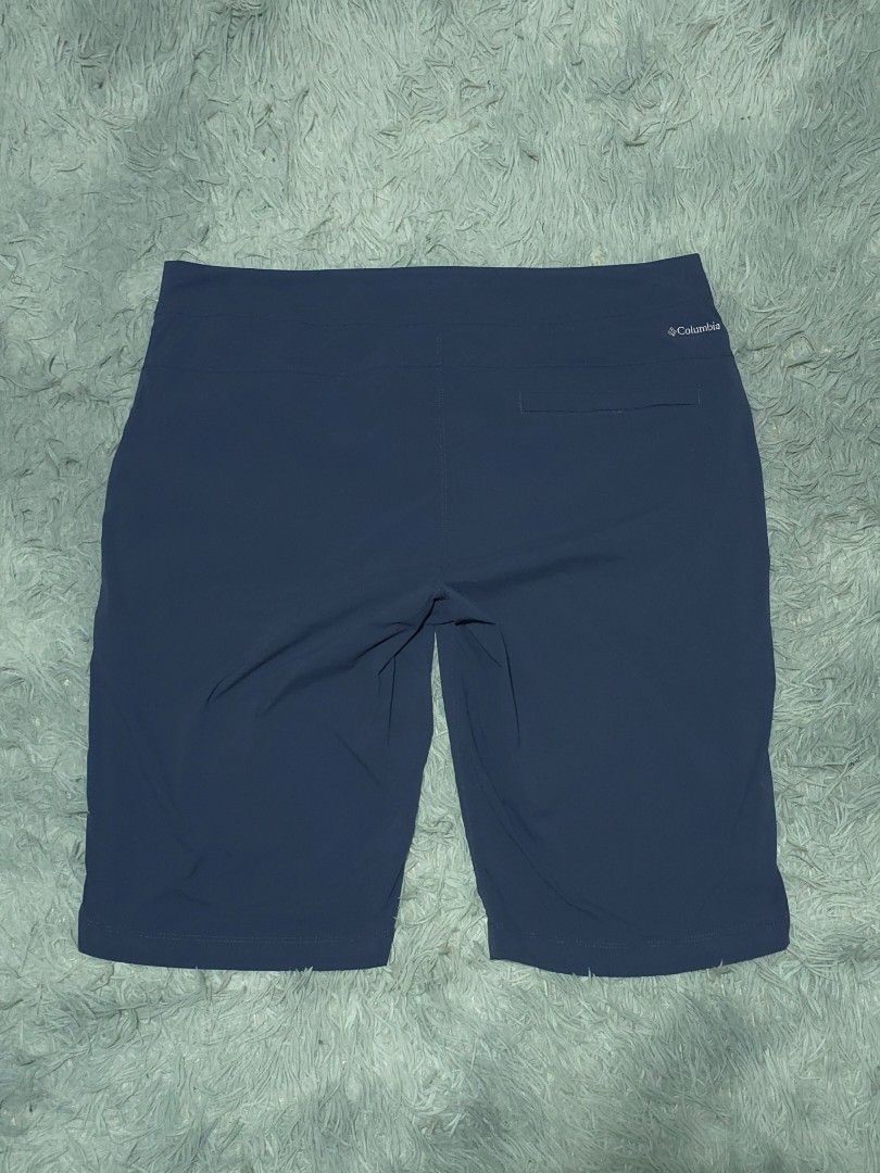 Columbia Navy Blue Athletic Drawstring Shorts (Category: Shorts) located in Abulug. Submitted by humanwhosellthings (Listing ID 1468179846, Image 1). Description: COLUMBIA Hiking Short ✅Excellent Condition ✅Issue: none ▫️Waist Size: 36 ▫️Length: 21.5 - Waist: Adjustable drawstring with metal eyelets - Pockets: Back welt pocket with Columbia logo branding - Material: Lightweight fabric - Condition: Clean and well-maintained - Best for: Outdoor act