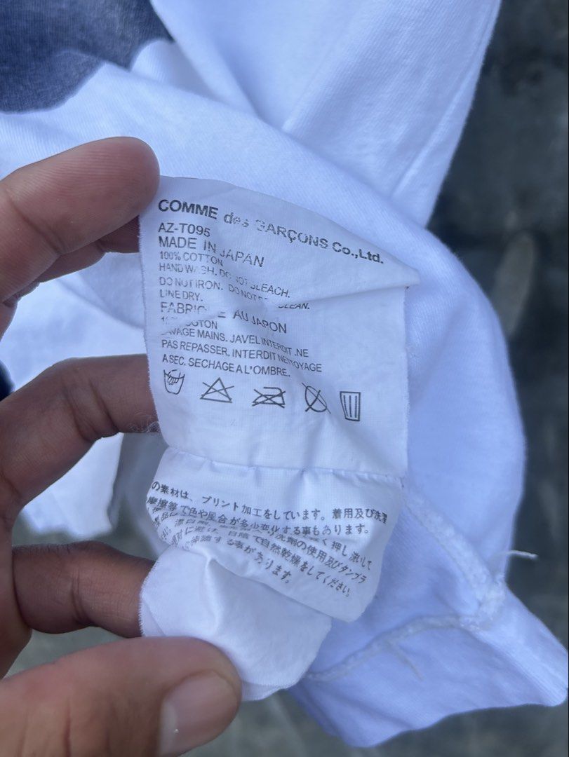 Comme Des Garçons Play Tee For HER (Category: Shirts) located in Tuguegarao City. Submitted by 2giefinds (Listing ID 1468125732, Image 3). Description: Size: small on tag Dimes: W:16 x L:21 Condition: Excellent Color Rate: 9.8/10 *white part | 9/10 *heart/Black part Issue: very minimal light dot stain *not sure if washable.