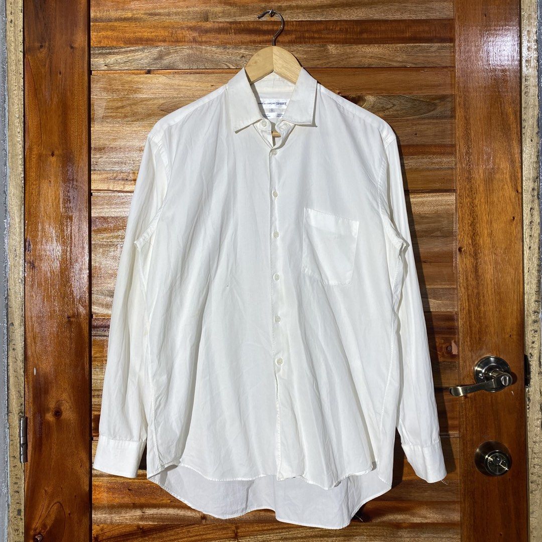 Comme des Garçons Shirt (Category: Shirts) located in Andop. Submitted by rhouzze.ph24 (Listing ID 1468174159, Image 1). Description: OPEN FOR NEGOTIATION Name: Comme des Garçons Dimensions: 23 by 30 Size: Small Issue: Yellow stains on some areas, refer to the photos for the details.