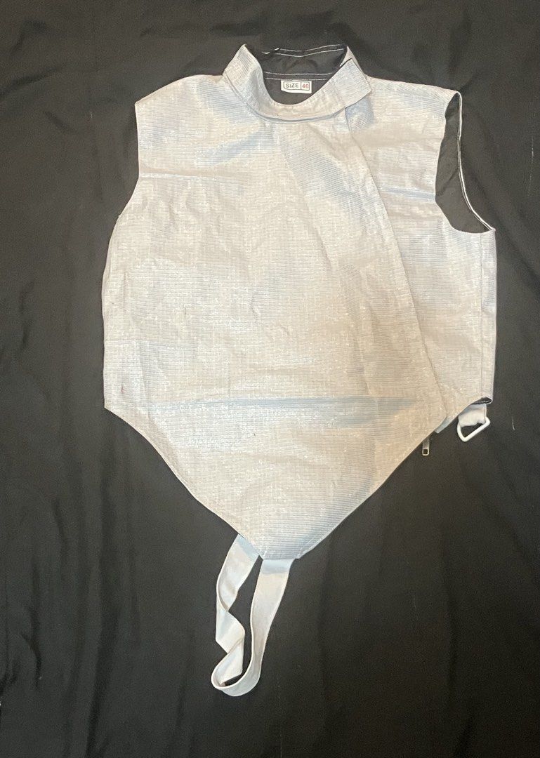Fencing Set Uniform Foil (Category: Combat Sports) located in Quezon City. Submitted by remmusloveshaon (Listing ID 1468254586, Image 3). Description: - Complete fencing kit ready for practice or competitions - CE350NW-rated white jacket and trousers (size 46) - Foil weapon with distinctive red guard and yellow handle - Fencing mask and metallic vest included - Size M chest protector for safety - Spacious protective gear bag to carry everything -