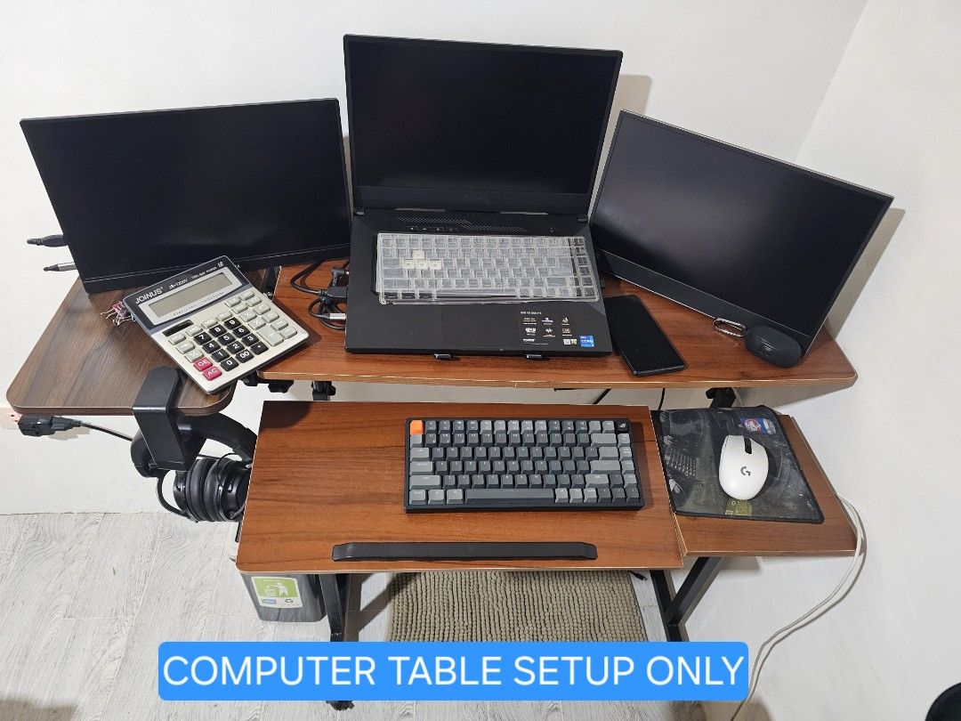 Computer Table Setup with Extension (Category: Tables & Sets) located in Paranaque City. Submitted by galithea17 (Listing ID 1468257273, Image 1). Description: ▪︎ Condition: Preloved, well-maintained ▪︎ Material: Durable wooden tiers with a sturdy black metal frame ▪︎ Best For: work-from-home setups, and multi-monitor configurations ✔️ Computer table only (electronics and accessories in photos are NOT included) ✔️ RFS: Moving-out / Decluttering S
