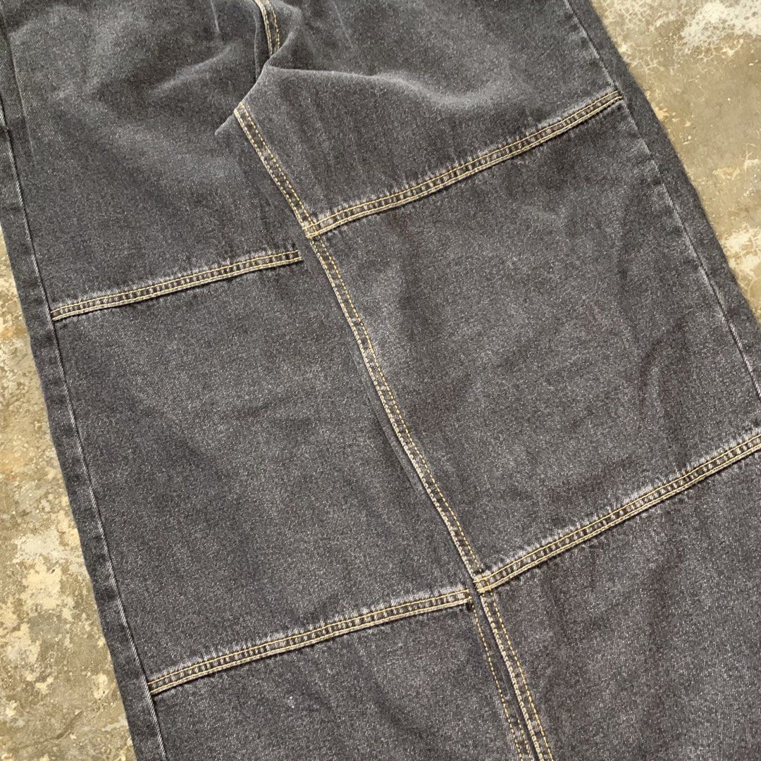 Concrete Black Denim Jeans (Category: Jeans) located in Abucay. Submitted by castoffsfinds (Listing ID 1468136436, Image 3). Description: - Brand: Concrete - Color: Dark washed black - Fit: Wide leg - Material: Heavyweight denim - Details: Contrast stitching and paneled construction - Features: Classic five-pocket styling with button fly and branded interior waistband tag.