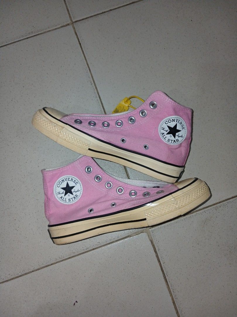 Converse Chuck 70 Hi Pink Sneakers (Category: Sneakers) located in Daraga. Submitted by thethriftcity2024 (Listing ID 1468105224, Image 1). Description: - Brand: Converse Chuck 70 High Top - Color: Pink Canvas - Size: US Men 3 / US Women 5 / UK 3 / EUR 35 (235mm) - Features: Vintage-style rubber midsole with black pinstripe, classic star ankle patch, and brown diamond pattern outsole - Origin: Made in Vietnam - Condition: Clearly marked inner siz