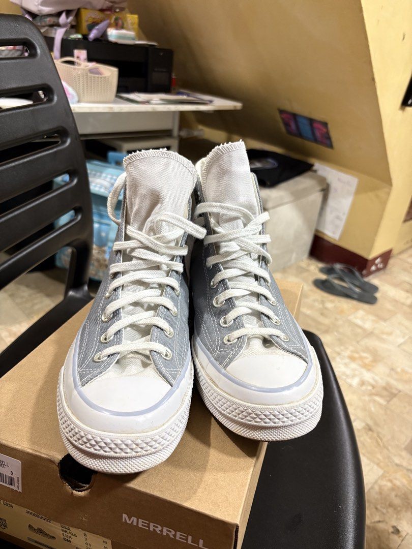 Converse Chuck Taylor All Star High Top Grey (Category: Sneakers) located in Manila. Submitted by breezy09breezy (Listing ID 1468090392, Image 3). Description: - Authentic grey Converse high tops - Classic white laces and white rubber toe caps - Distinct textured C logo patch on the side - Iconic All Star license plate on the heels - Red Converse Chuck Taylor logo on inner tongues - Clean white inner linings likenew.