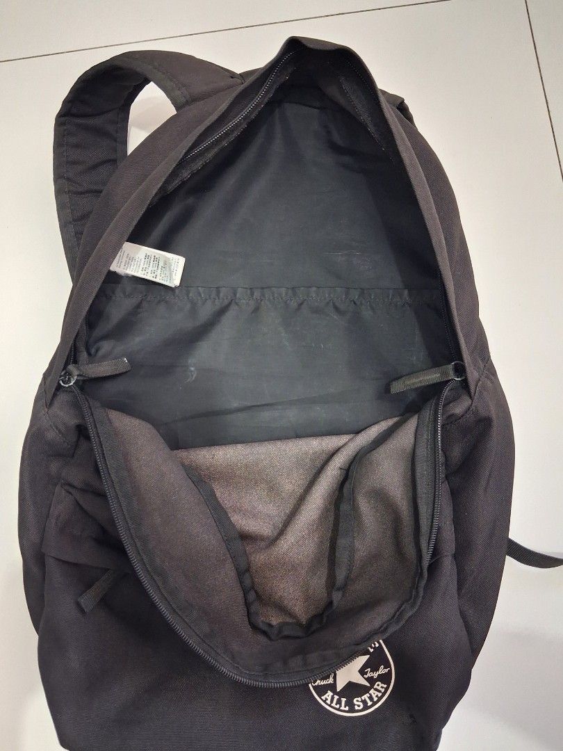 Converse Chuck Taylor All Star Black Backpack (Category: Backpacks) located in Legazpi City. Submitted by flordelotus (Listing ID 1468101985, Image 3). Description: Authentic Converse black bag, originally bought for ₱1,000+ on orange app - Color: Black - Condition: Well-used - Has a fray spot at the bottom, but it is not completely through the material (not a hole). - Visible signs of use; please refer to the photos for the actual condition. Wha