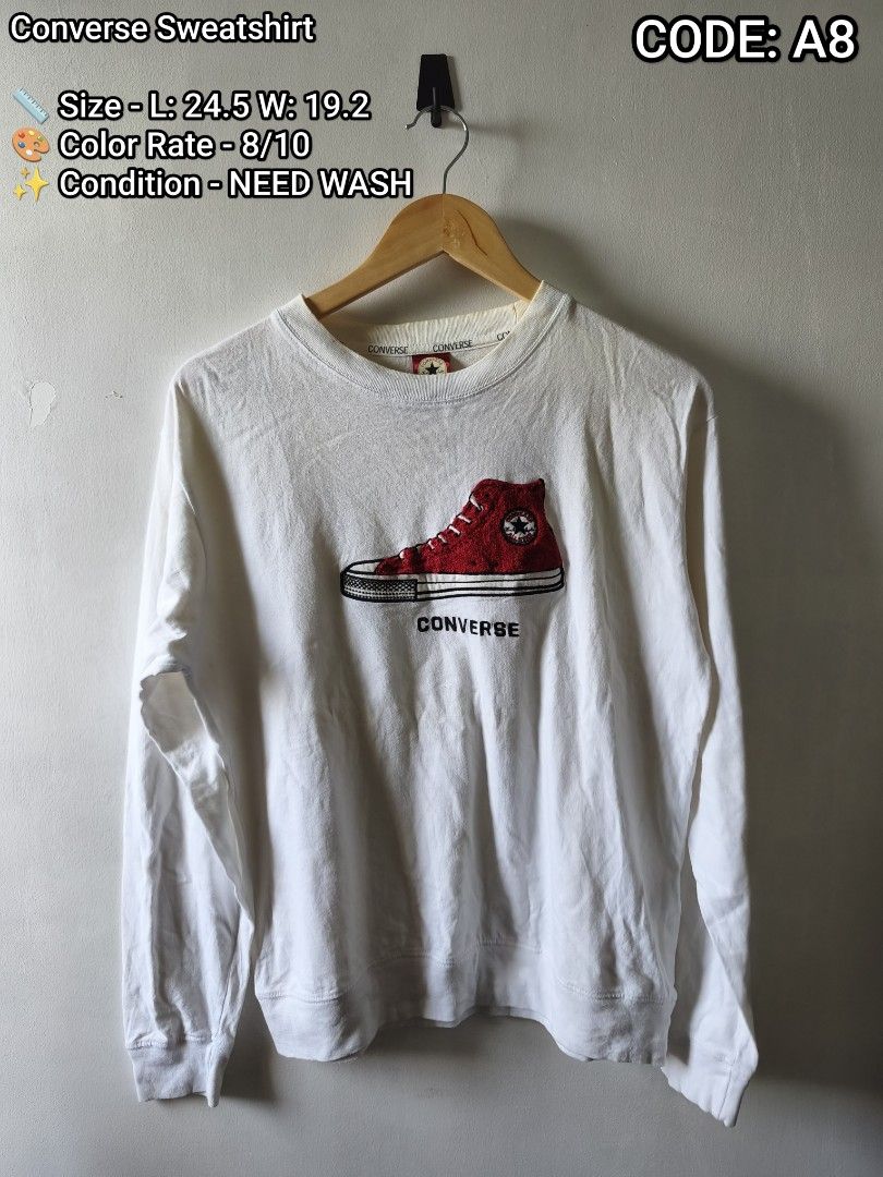 Converse Sweatshirt White Red Graphic Long Sleeve Code A8 (Category: Coats, Jackets and Outerwear) located in Manila. Submitted by gelog2 (Listing ID 1468145134, Image 1). Description: - Brand: Converse - Color: White with red high-top sneaker embroidery - Style: Crew neck, long sleeves, ribbed cuffs and hem, branded tape inside collar - Tagged code: A8 - Measurements: Length 24.5 inches, Width 19.2 inches - Condition: 8/10 color rate, needs a wa