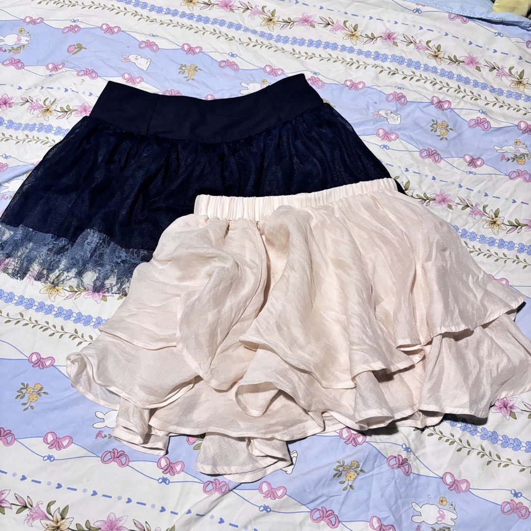 Coquette skirt bundle (Category: Skirts) located in Taguig. Submitted by eladela.closet (Listing ID 1468066675, Image 1). Description: fits 24-25 waist flaw on blue skirt missing zipper jewel/holder but functional.