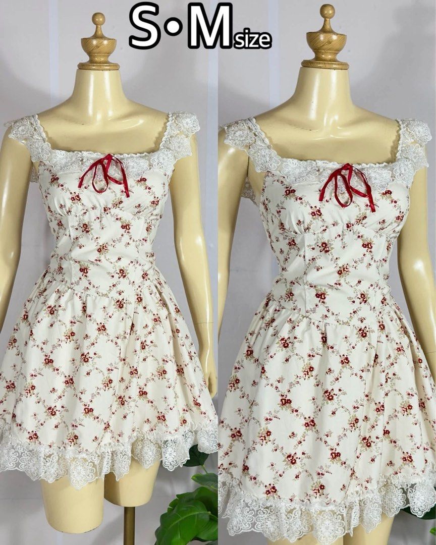 coquette-style square-neck floral (Category: Dresses) located in Davao. Submitted by theresetshelf (Listing ID 1468168823, Image 1). Description: 🌸Super sweet, princess-style mini dress perfect for the dollette, coquette, or J-fashion aesthetic! Features delicate white lace trimming along the square neckline, sleeves, and hem, with a dainty red ribbon bow accent at the bust..