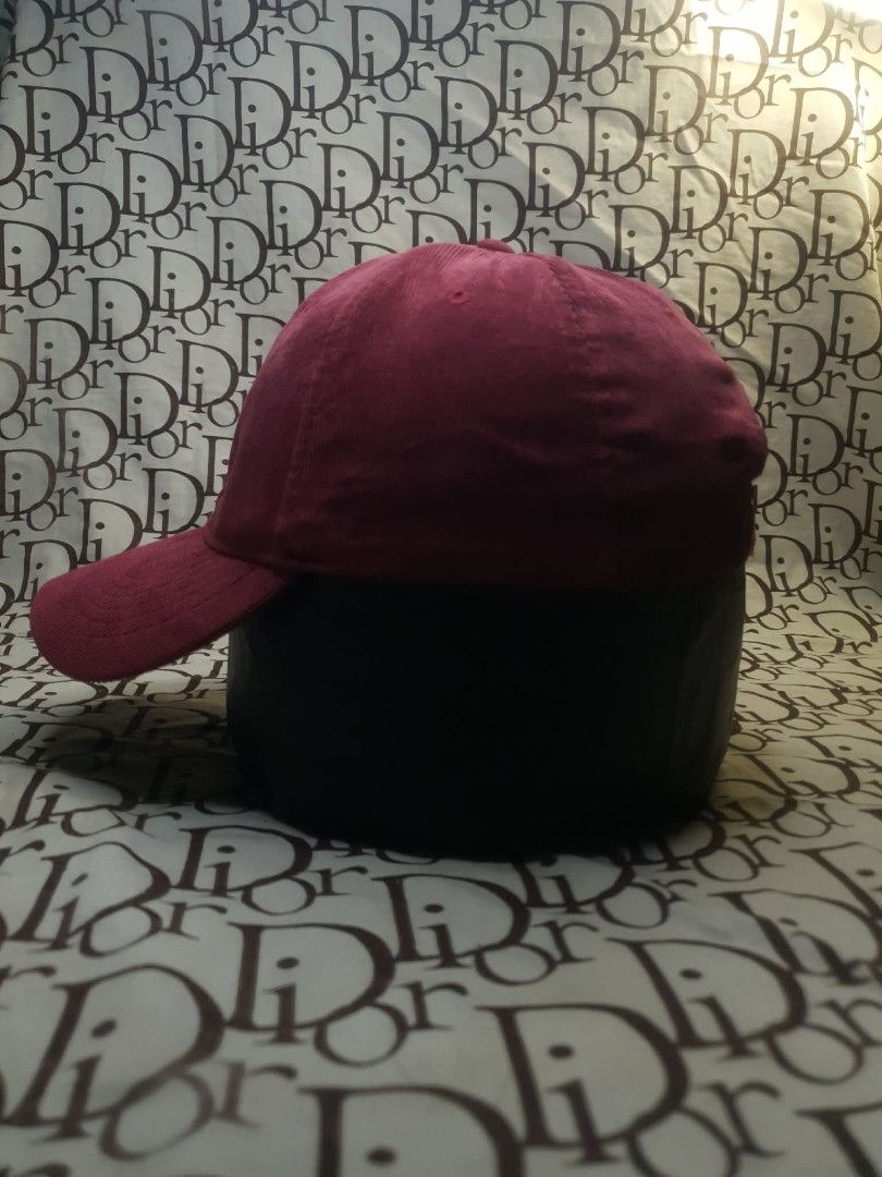 CORDUROY BASEBALL CAP (Category: Caps & Hats) located in San Fernando. Submitted by _jaximus (Listing ID 1468217962, Image 2). Description: - Color: Rich burgundy - Material: 65% cotton, 35% polyester blend - Closure: Adjustable metal strap at the back for a custom fit - Interior: Standard white inner paneling with clean taped seams - Condition: Clean throughout with original tag intact.
