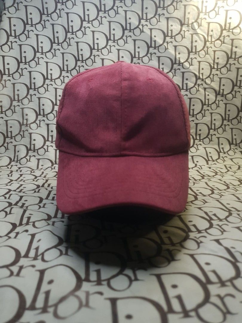 CORDUROY BASEBALL CAP (Category: Caps & Hats) located in San Fernando. Submitted by _jaximus (Listing ID 1468217962, Image 1). Description: - Color: Rich burgundy - Material: 65% cotton, 35% polyester blend - Closure: Adjustable metal strap at the back for a custom fit - Interior: Standard white inner paneling with clean taped seams - Condition: Clean throughout with original tag intact.