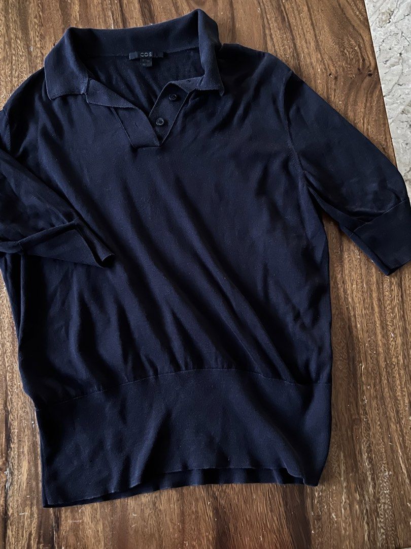 COS Black Cotton Silk Polo (Category: Blouses) located in Angeles City. Submitted by msr093 (Listing ID 1468126254, Image 1). Description: COS black polo in size M. Material is 55% silk and 45% cotton, super soft blend. Classic polo collar with two buttons. Ribbed cuffs and hem line. Minimalist style, great basic for layering or wearing on its own. EUR M sizing. L 24in x W 20in x Sleeve length 11in.