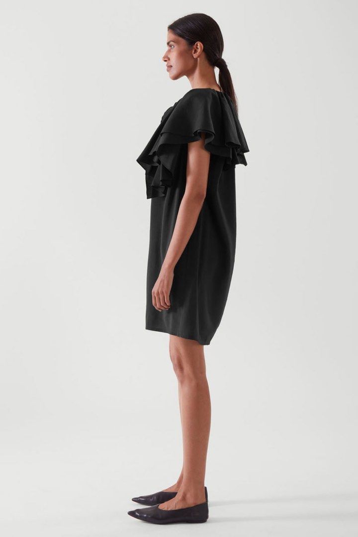 COS RUFFLED TUNIC DRESS (Category: Dresses) located in Pasig City. Submitted by vetementsdemanila (Listing ID 1468205416, Image 2). Description: COS RUFFLED TUNIC DRESS New with tags Size: 38 Retail price 790 HKD Bust: 46 inches Waist: 46 inches Length: 34 inches P1980 PLUS SHIPPING.