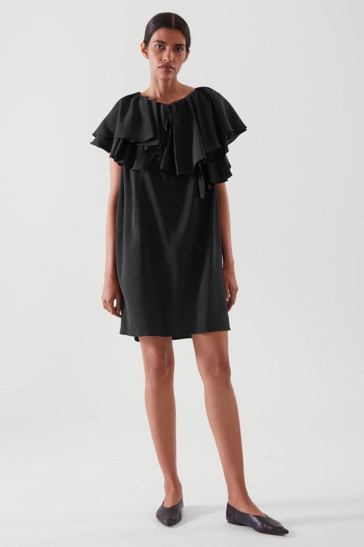 COS RUFFLED TUNIC DRESS (Category: Dresses) located in Pasig City. Submitted by vetementsdemanila (Listing ID 1468205416, Image 1). Description: COS RUFFLED TUNIC DRESS New with tags Size: 38 Retail price 790 HKD Bust: 46 inches Waist: 46 inches Length: 34 inches P1980 PLUS SHIPPING.