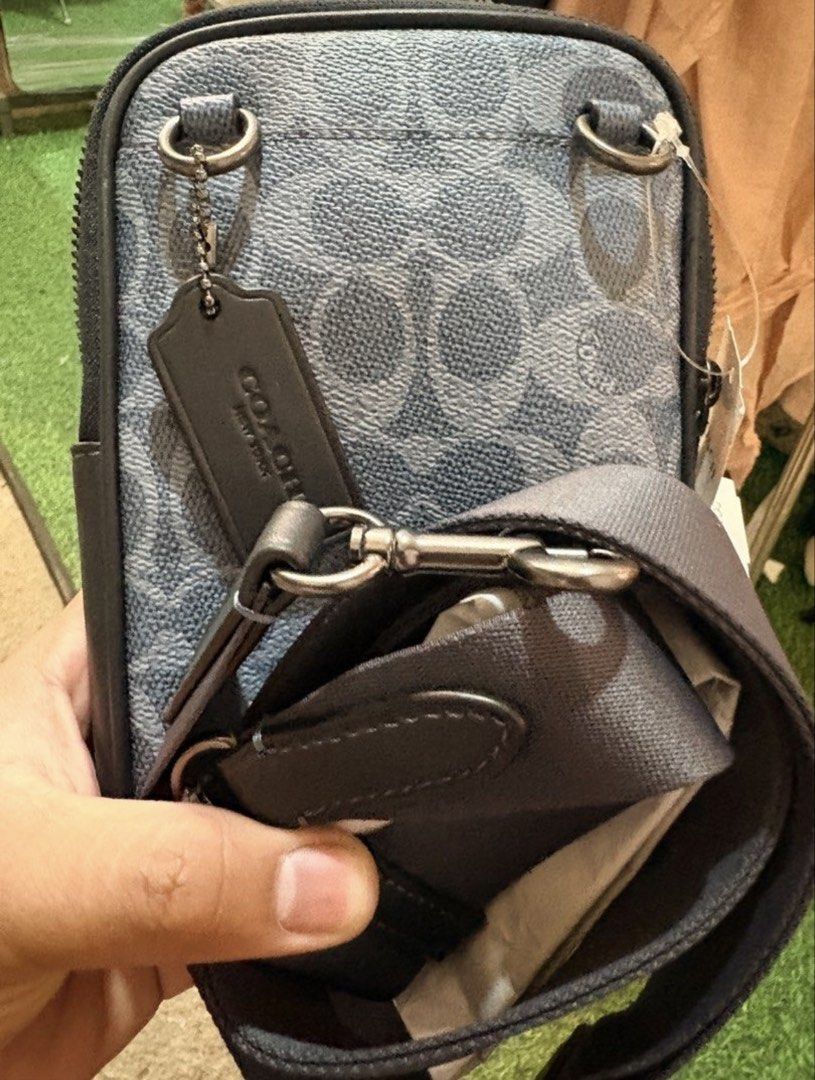 Coach Aden Crossbody bag (Category: Cross-body Bags) located in Manila. Submitted by josh2295 (Listing ID 1468279717, Image 3). Description: This Coach Aden Crossbody Bag in Signature Canvas (Style CW364) is a compact, vertical sling/phone bag designed for sleek everyday utility..