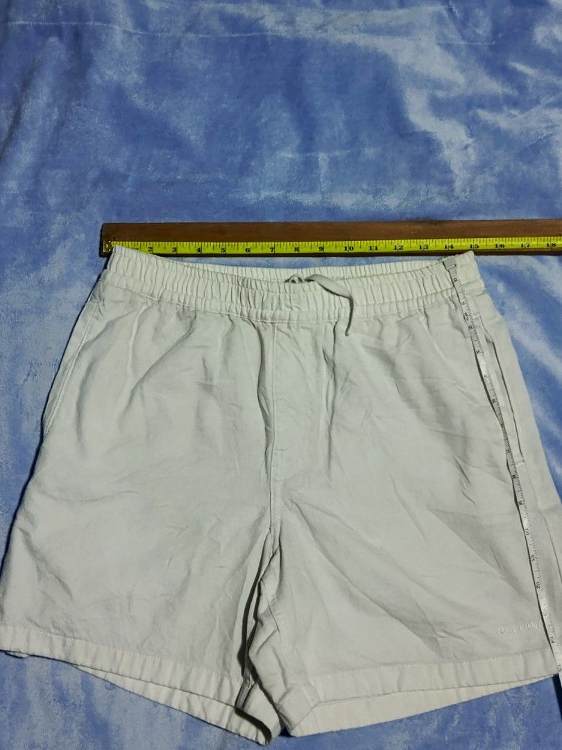 Covernat White Drawstring Shorts Size L (Category: Shorts) located in City of Isabela. Submitted by warmbird.d06e6f (Listing ID 1468150497, Image 3). Description: - Brand: Covernat - Color: Off-white - Material: Lightweight cotton - Waistband: Elastic with adjustable drawstring - Pockets: Front pockets and one back pocket with button closure - Details: Subtle Covernat Authentic embroidery near the hem - Condition: Perfect for casual daily wear.