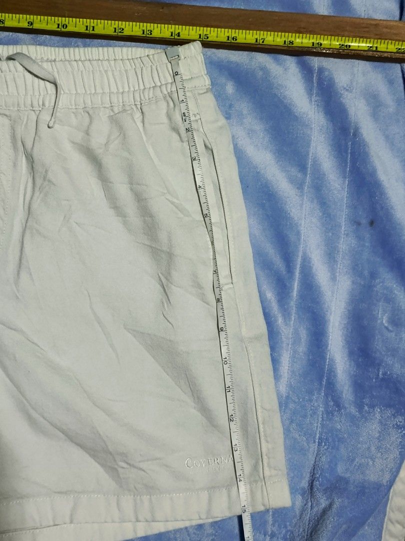 Covernat White Drawstring Shorts Size L (Category: Shorts) located in City of Isabela. Submitted by warmbird.d06e6f (Listing ID 1468150497, Image 2). Description: - Brand: Covernat - Color: Off-white - Material: Lightweight cotton - Waistband: Elastic with adjustable drawstring - Pockets: Front pockets and one back pocket with button closure - Details: Subtle Covernat Authentic embroidery near the hem - Condition: Perfect for casual daily wear.