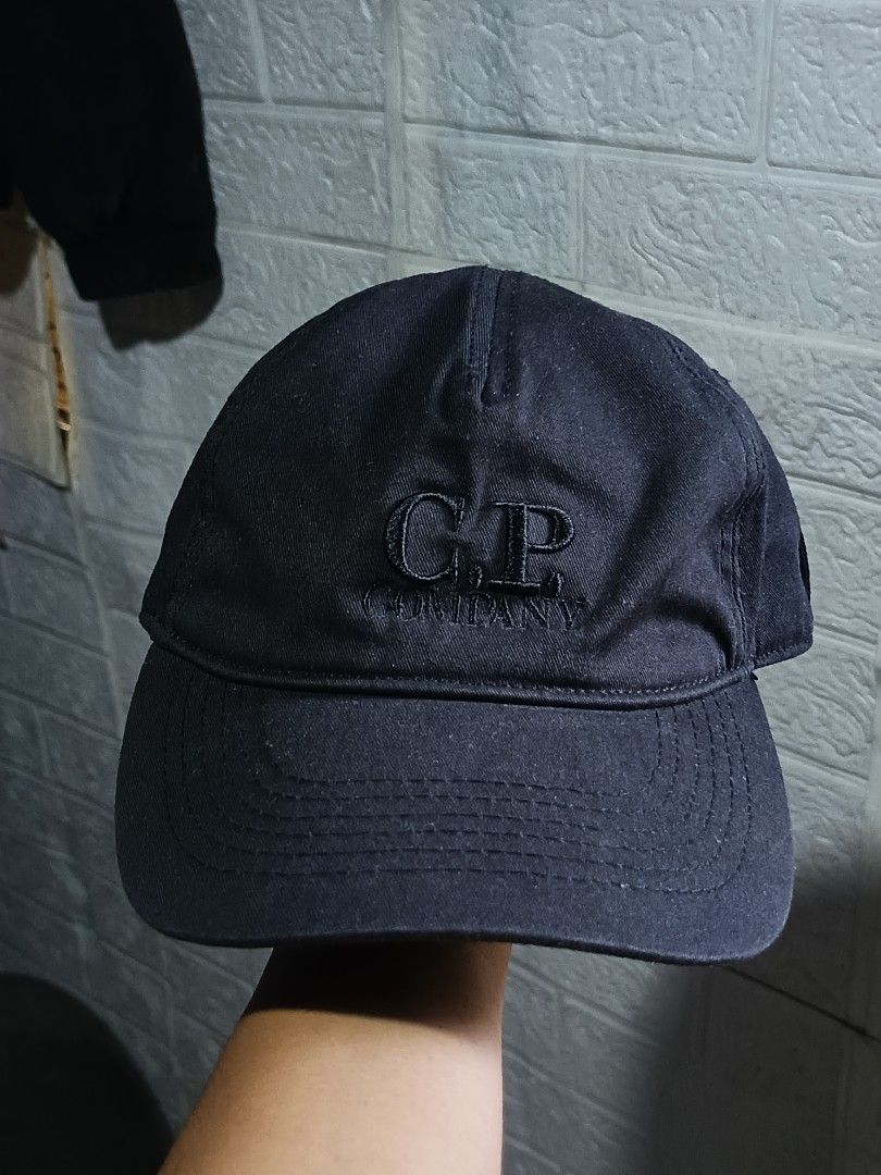 C.P. Company Goggle Baseball Cap Black Size M (Category: Caps & Hats) located in Caloocan City. Submitted by gemfinder669 (Listing ID 1468096248, Image 1). Description: - Brand: C.P. Company - Item: Baseball Cap - Color: Black - Size: M - Material: 100% cotton - Signature built-in goggles on the brim - Embroidered logo lettering on front panels - Interior brand tags and care labels completely intact - Country of manufacture: China - Production da