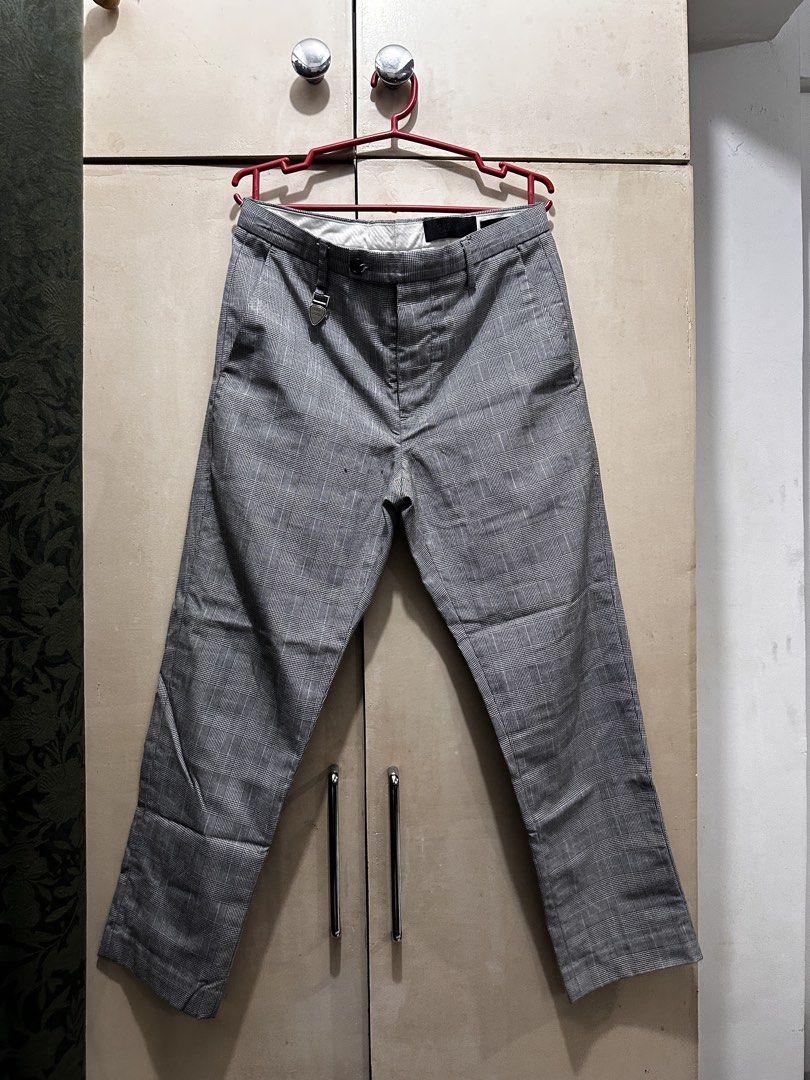 CPS Men Blackline Grey Plaid Trousers (Category: Trousers) located in Manila. Submitted by vicnoay (Listing ID 1468279028, Image 1). Description: - Brand/Model: CPS Men Blackline trousers - Pattern: Grey plaid - Fit: Clean tailored fit - Details: Branded metal guitar pick charm on front belt loop - Closure: Button closure with zip fly - Pockets: Functional welt pockets in the back - Sizing: Standard menswear sizing - Style: Ideal for office wear 