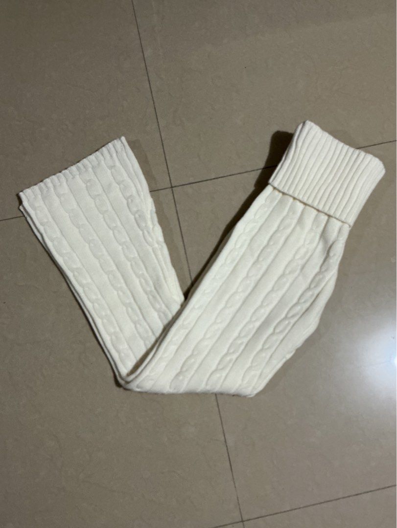Cream cable knit flare pants (Category: Jeans) located in Bulacan. Submitted by toogoodtobegarbage (Listing ID 1468189543, Image 1). Description: - Color: cream cable knit pants with a flared leg cut. - Size M: can fit to small - never used - no flaws - available in black (check my profile).