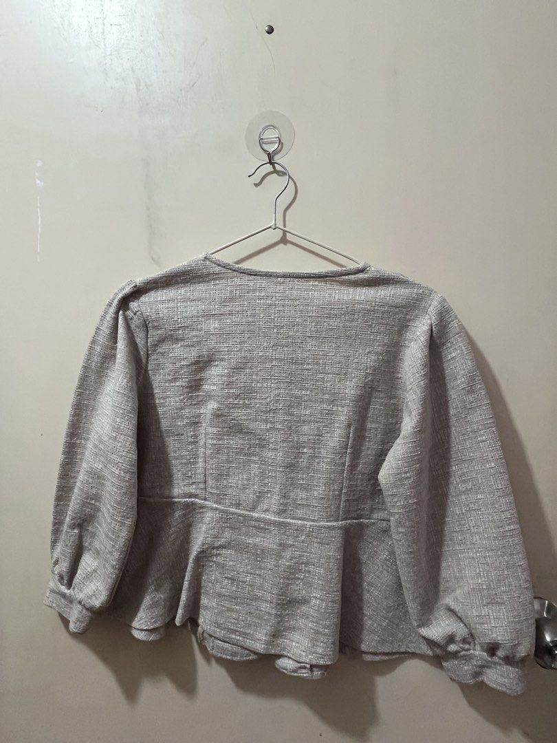 Cream long-sleeves button down (Category: Longsleeves) located in Manila. Submitted by aiyuan17 (Listing ID 1468153907, Image 3). Description: Cream long-sleeves button down W: 17.5 L: 18.5 Sleeve length: 18 -Can be use as cardigan -peplum cut.