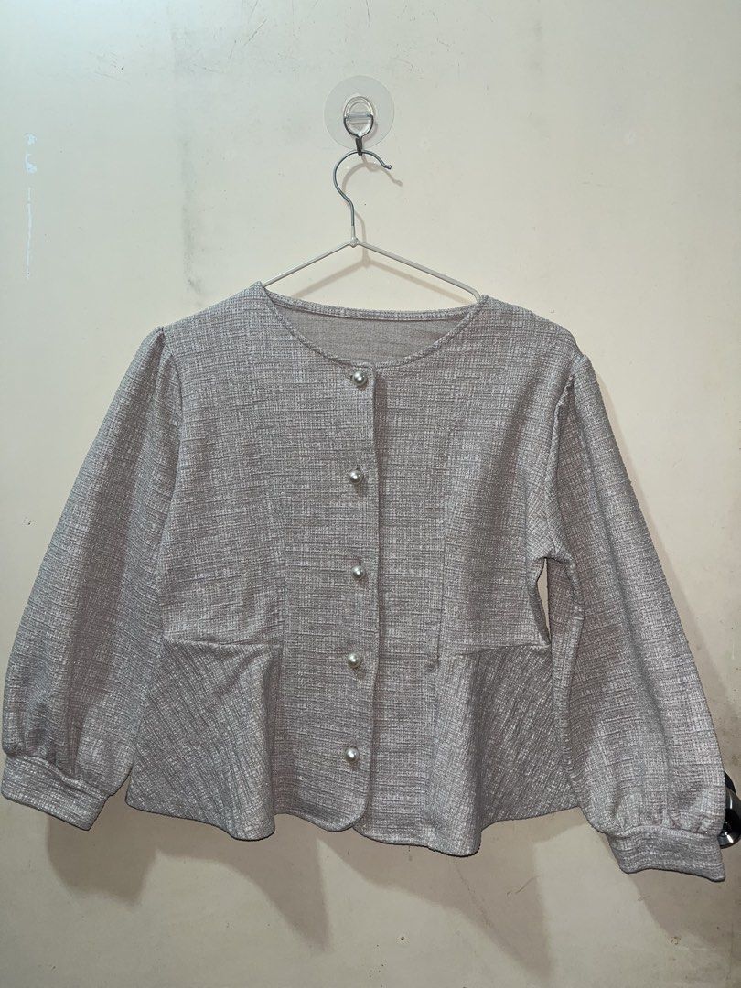 Cream long-sleeves button down (Category: Longsleeves) located in Manila. Submitted by aiyuan17 (Listing ID 1468153907, Image 1). Description: Cream long-sleeves button down W: 17.5 L: 18.5 Sleeve length: 18 -Can be use as cardigan -peplum cut.
