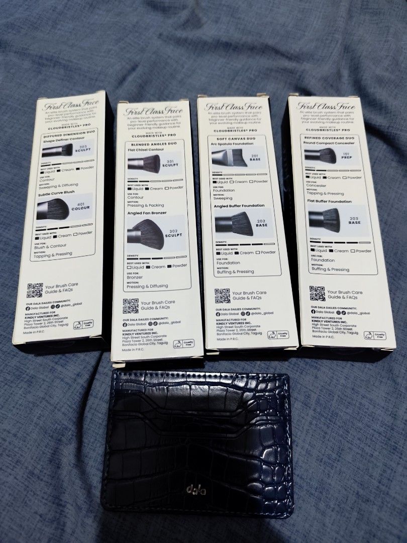 Dala Makeup Brush Duos Variety Pack (Category: Makeup) located in Quezon City. Submitted by shadydelosreyes1988 (Listing ID 1468098451, Image 2). Description: - Set of 4 award-winning Dala makeup brush duos - Includes Diffused Dimension Duo, Blended Angles Duo, Soft Canvas Duo, and Refined Coverage Duo - 100% brand new, boxes are factory sealed and unopened - Features stylish and sleek navy blue handles - Perfect addition to your everyday makeup 