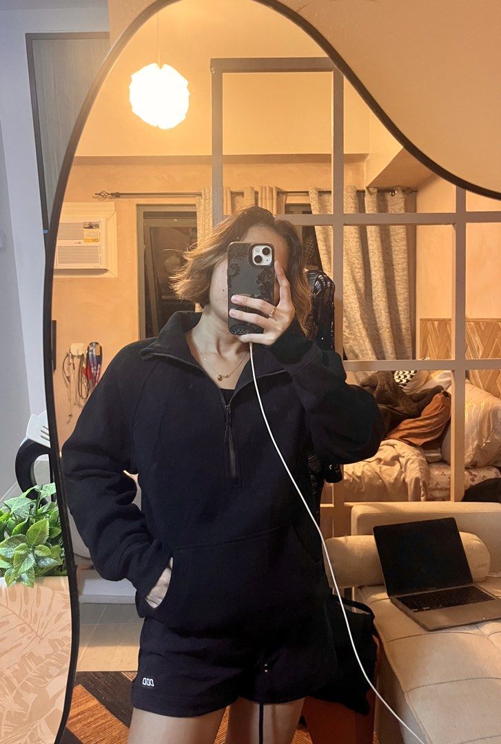 Danskin Black Half-Zip Sweatshirt with Kangaroo Pocket (Category: Coats, Jackets and Outerwear) located in Cebu City. Submitted by harborclothing29 (Listing ID 1468266311, Image 1). Description: Solid black half-zip sweatshirt with a front kangaroo pocket and high collar. Relaxed fit through the body and sleeves. Material feels soft and warm. Matching black shorts also worn in the photo. Easy piece to throw on for running errands or lounging at h