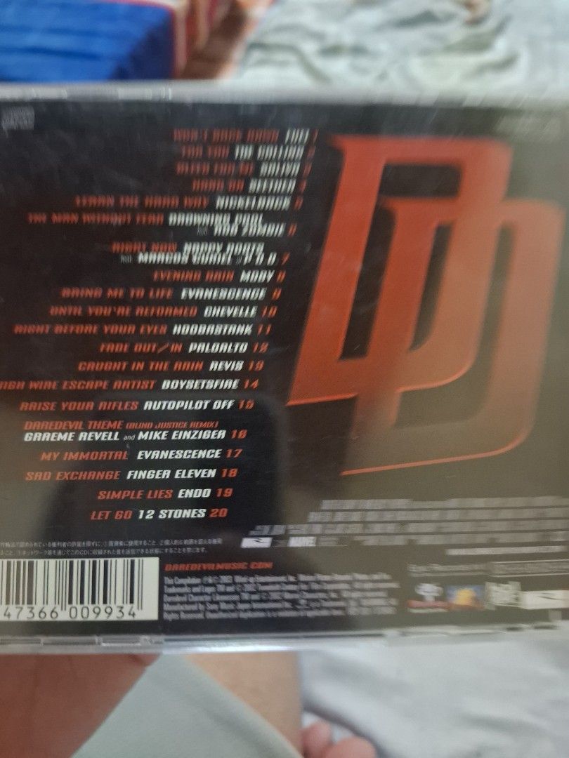 Daredevil The Album Soundtrack CD (Category: CDs & DVDs) located in San Jose del Monte. Submitted by youweiner48495 (Listing ID 1468141311, Image 3). Description: - Item: Daredevil Original Motion Picture Soundtrack CD - Condition: Excellent, clean and scratch-free disc surface - Packaging: Jewel case with cover insert and back tracklist - Featured Artists: Evanescence, Drowning Pool, Nickelback, Moby, and more - Perfect for: Rock music fans and 