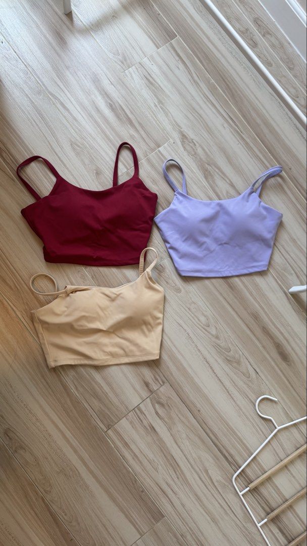Dazy Padded Crop Top Bundle Size M (Category: Sleeveless) located in Makati City. Submitted by declutter_forsale (Listing ID 1468200017, Image 1). Description: ₱500 take all - Bundle of 3 Dazy padded crop tops - Colors: Maroon, purple, and nude beige - Size: Medium (all with tags attached) - Built-in bra pads for comfort, no underwire - Stretchy fabric ideal for workouts or lounging - Sold as a set only.