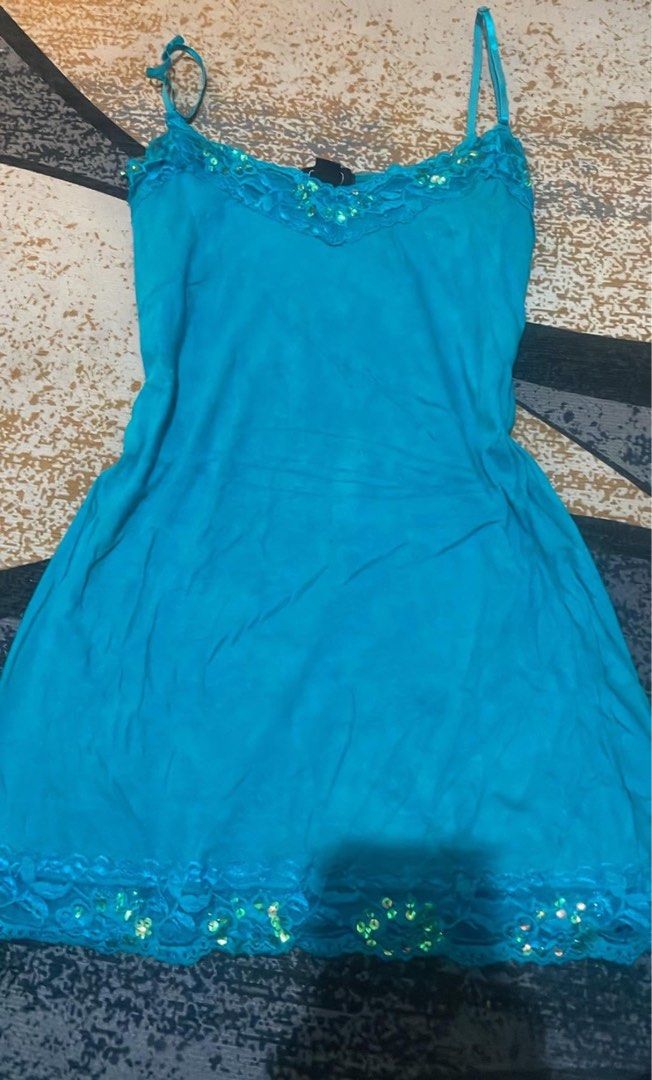 Deb Teal Camisole top with Lace and Sequins Medium (Category: Sleeveless) located in Lapu Lapu. Submitted by ruby_welly22 (Listing ID 1468264046, Image 1). Description: - Brand: Deb - Size: Medium - Color: Bright teal - Details: Delicate lace trim and sparkling sequins on neckline and hem - Straps: Adjustable spaghetti straps - Material: Lightweight, flowy fabric - Best for: Parties and casual outings - Condition: Excellent.