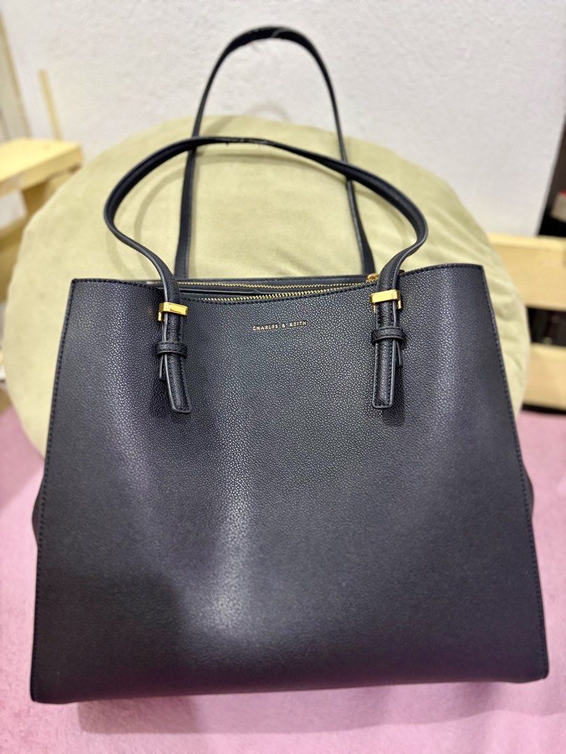 DECLUTTER: Charles & Keith Black Tote Bag & 2 freebies (Category: Tote Bags) located in Manila. Submitted by cherslugo (Listing ID 1468241197, Image 1). Description: TAKE ALL FOR ₱1,900 Authentic Charles & Keith with dust bag - Classic Black with Gold-tone hardware - Structured tote bag with double shoulder straps - Clean lining, center zip divider, and zipper compartments for organization - Condition: Excellent, perfect for everyday work or casu