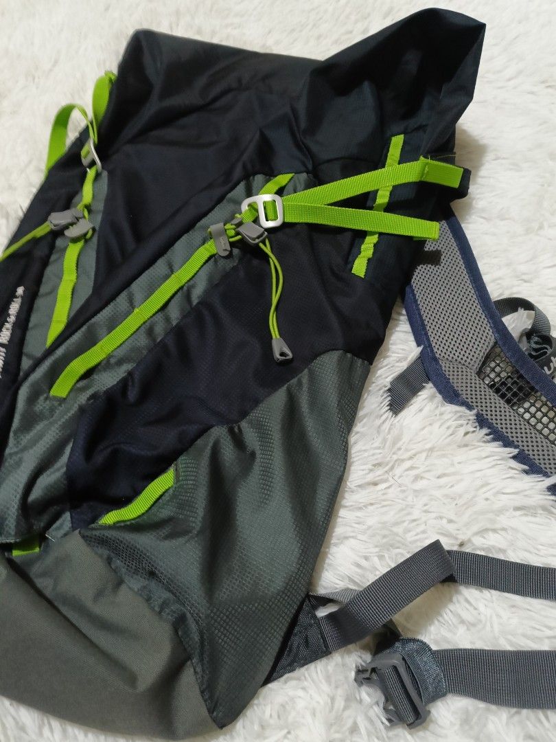 Deuter Gravity Rock and Roll 30 Backpack (Category: Backpacks) located in Quezon City. Submitted by jdwoah12 (Listing ID 1468070220, Image 3). Description: - Brand: Deuter Model: Gravity Rock and Roll 30 - Color: Navy blue and grey with bright green accents - Design: Roll-top with adjustable straps and secure buckles - Comfort: Breathable mesh shoulder straps - Condition: Clean exterior and interior, excellent ready-to-use condition - Versatility