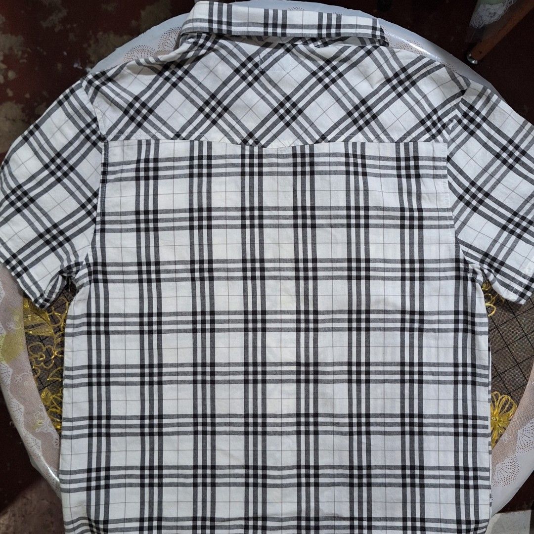 Dickies short-sleeve tartan plaid pattern (Authentic) (Category: Tshirts & Polo Shirts ) located in Pasig City. Submitted by zelzelly (Listing ID 1468197192, Image 2). Description: RFS: Decluterring, never used because too fit for the size of the owner, and stored only on the cabinet for months. • Market value ranges at 400 to 800 PHP • M - L sizing • Price are negotiable • More details of the cloth in every slide. • Never used because too fit fo
