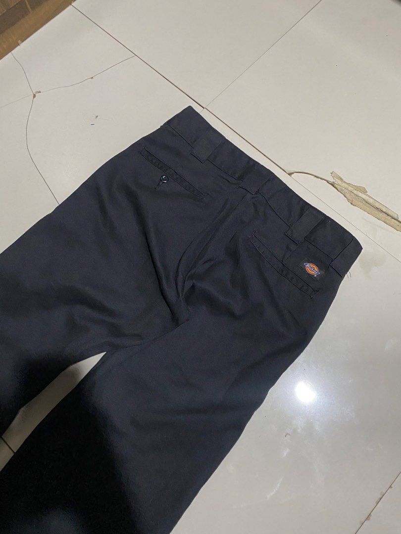 Dickies Slim Fit Black Work Pants (Category: Trousers) located in Antipolo. Submitted by cogiestamaria (Listing ID 1468179526, Image 3). Description: - Brand: Dickies - size 30-32 - Length 41 - Leg Opening 8.5 - no issue - color rate 9.5-10 - excellent condition - Fit: Slim fit, straight leg - Color: Solid black - Details: Standard belt loops, rear welt pockets, iconic logo patch - Condition: Clean hems, solid stitching throughout - Style: Versat
