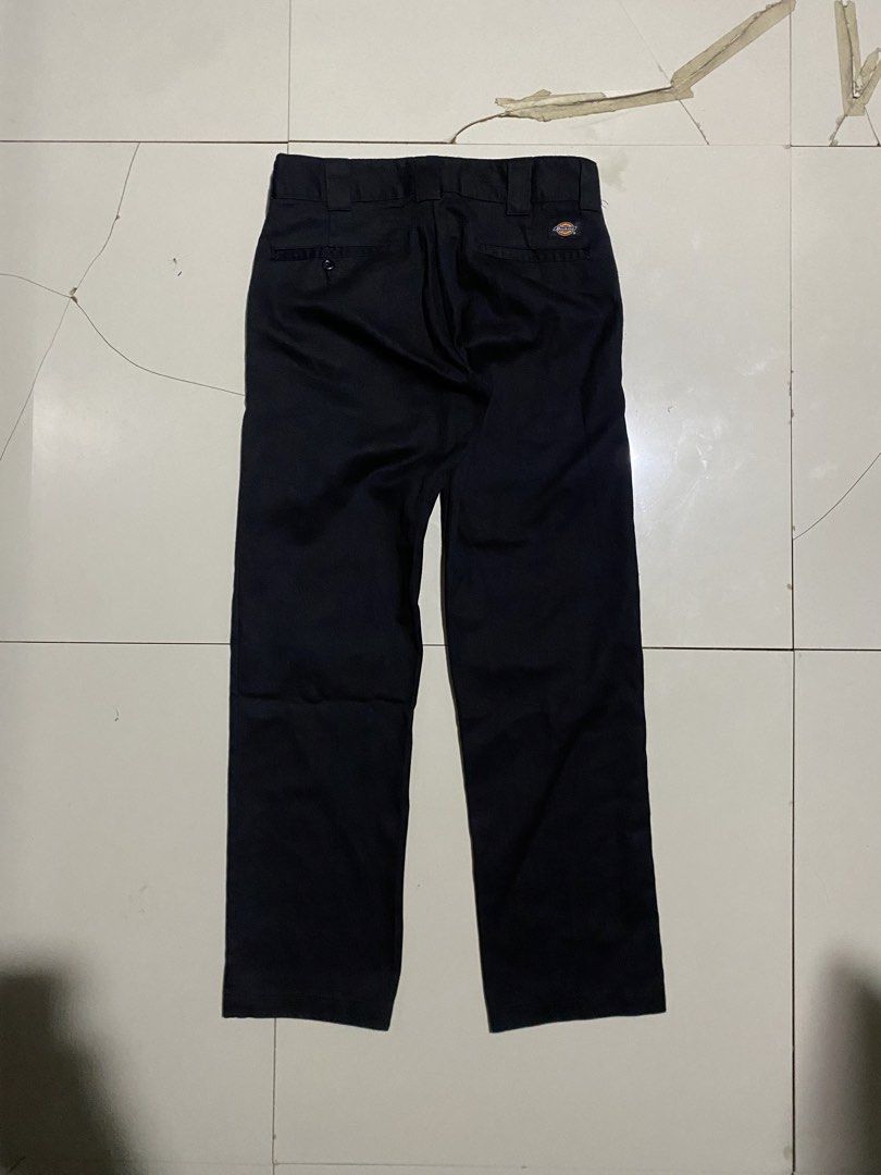 Dickies Slim Fit Black Work Pants (Category: Trousers) located in Antipolo. Submitted by cogiestamaria (Listing ID 1468179526, Image 1). Description: - Brand: Dickies - size 30-32 - Length 41 - Leg Opening 8.5 - no issue - color rate 9.5-10 - excellent condition - Fit: Slim fit, straight leg - Color: Solid black - Details: Standard belt loops, rear welt pockets, iconic logo patch - Condition: Clean hems, solid stitching throughout - Style: Versat