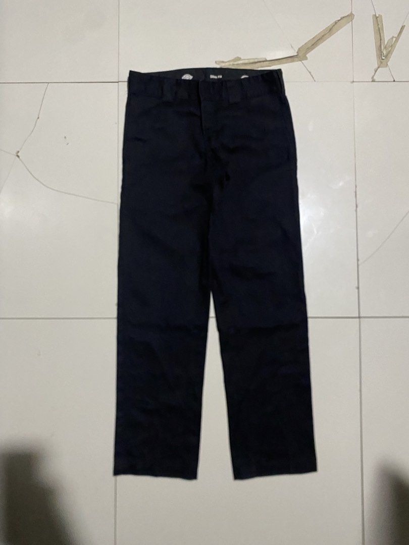 Dickies Slim Fit Black Work Pants (Category: Trousers) located in Antipolo. Submitted by cogiestamaria (Listing ID 1468179526, Image 2). Description: - Brand: Dickies - size 30-32 - Length 41 - Leg Opening 8.5 - no issue - color rate 9.5-10 - excellent condition - Fit: Slim fit, straight leg - Color: Solid black - Details: Standard belt loops, rear welt pockets, iconic logo patch - Condition: Clean hems, solid stitching throughout - Style: Versat