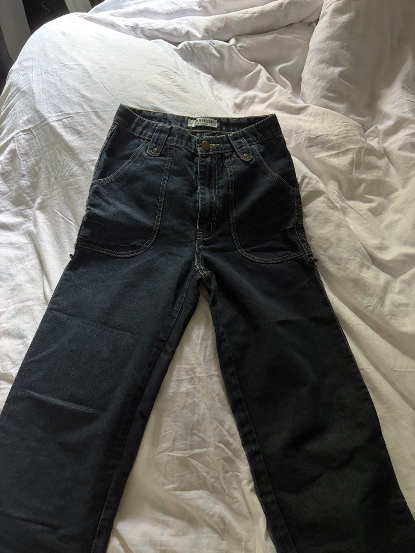 Dimension Clother Dark Denim Jeans Size M (Category: Jeans) located in General Santos City (Dadiangas). Submitted by jwtfg (Listing ID 1468111504, Image 3). Description: - Brand/Model: Dimension Clother dark denim jeans - Size: M - Fit: Straight leg with belt loops and button/zip fly - Wash: Mid-wash blue with contrast stitching - Details: Unique brass eyelet hardware down the sides, front curved patch pockets, and back pockets with stitching.