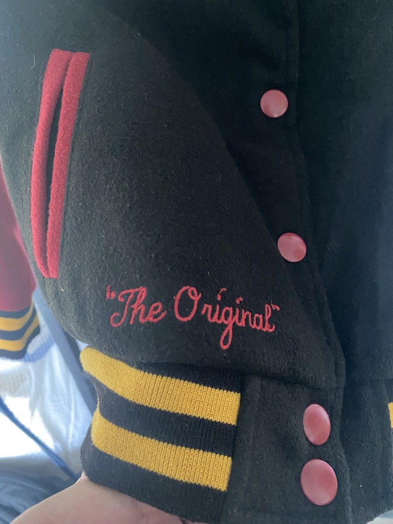 Disney Mickey and Pluto Varsity Jacket Size US 4 (Category: Babies & Kids Fashion) located in Las Pinas. Submitted by dhyn29 (Listing ID 1468158176, Image 3). Description: - Authentic Disney varsity jacket featuring Mickey and Pluto on the back - Classic black body with contrasting red sleeves and yellow-striped ribbed trim - Embroidered ' folks!' on the front chest and 'The Original' near the hem - Convenient snap button closure - Size: US 4 / U