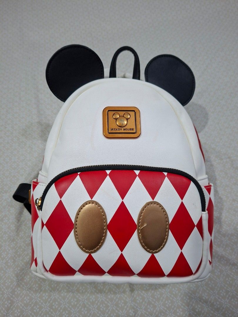 Disney Mickey Mouse Backpack Leather Red White Check Black Ears (Category: Backpacks) located in Quezon City. Submitted by clairy_fairy (Listing ID 1468230974, Image 2). Description: Slightly used though there is a stain but barely noticeable. open for negotiation.