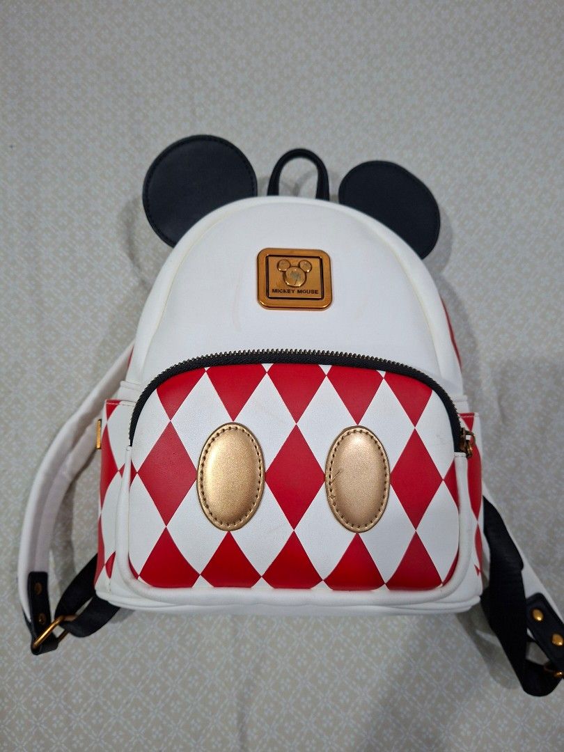 Disney Mickey Mouse Backpack Leather Red White Check Black Ears (Category: Backpacks) located in Quezon City. Submitted by clairy_fairy (Listing ID 1468230974, Image 1). Description: Slightly used though there is a stain but barely noticeable. open for negotiation.