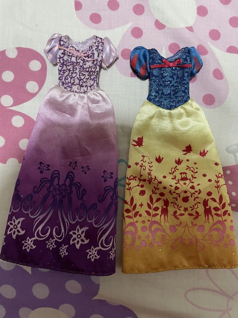 Disney Princess Doll Dresses (Category: Kids Toys) located in Angeles City. Submitted by livingdollaccesories (Listing ID 1468191846, Image 1). Description: disney princess hasbro dresses 50 pesos each or 100 peso bundle :)) can fit mh, eah, bratz, hasbro disney dolls.