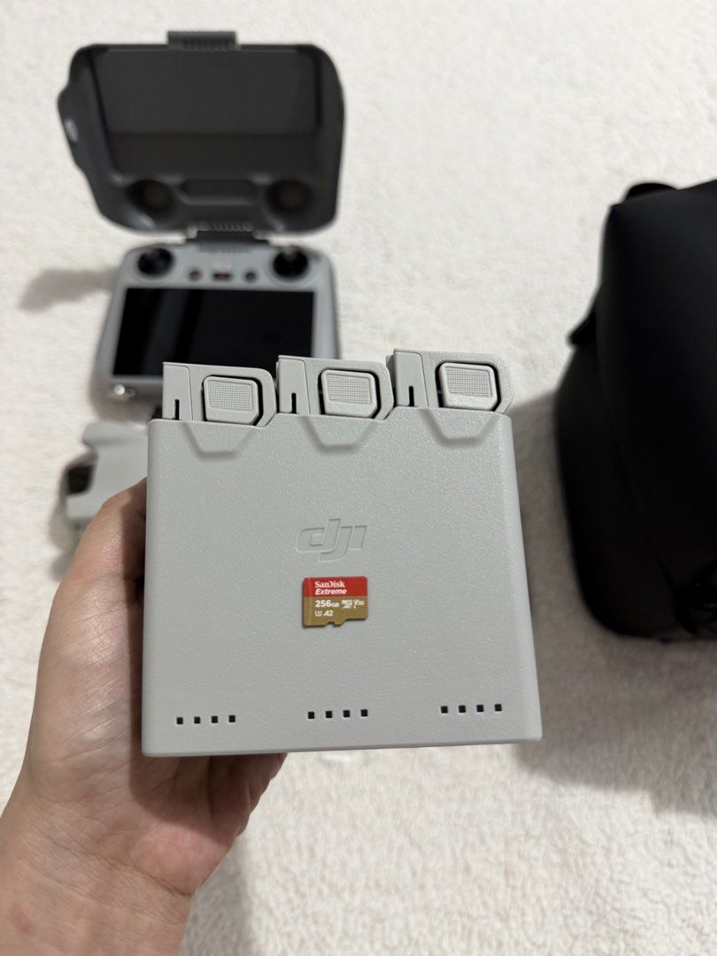 DJI Mini 3 Fly More Combo (Category: Other Gadgets) located in San Miguel. Submitted by quineellana (Listing ID 1468069946, Image 3). Description: DJI Mini 3 Fly More Combo Barely used and still in very good condition. We only used it during our trips to Batanes and Zambales. Inclusions: • DJI Mini 3 • Original DJI Controller / RC • 4 batteries total • Charger • Carrying bag Additional accessories: • SanDisk Extreme 256GB microSD card • Spare pro