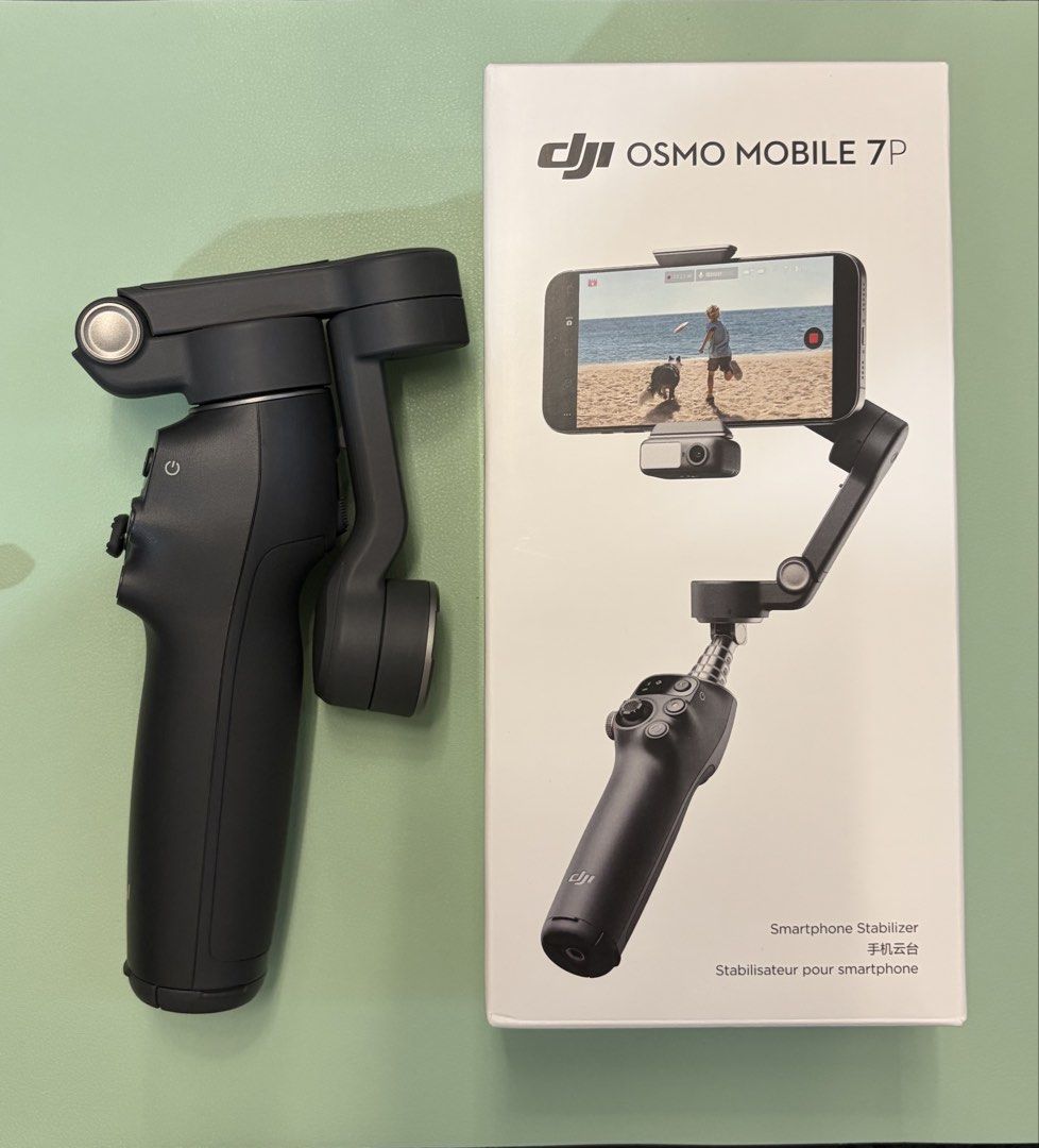 DJI Osmo Mobile 7P Smartphone Stabilizer (Category: Gimbals & Stabilizers ) located in Quezon City. Submitted by refittedph (Listing ID 1468234713, Image 1). Description: DJI Osmo Mobile 7P smartphone stabilizer. Complete set includes gimbal unit, magnetic phone clamp, USB-C charging cable, and drawstring storage pouch. Original box included. Everything in good condition. No dents and scratches..