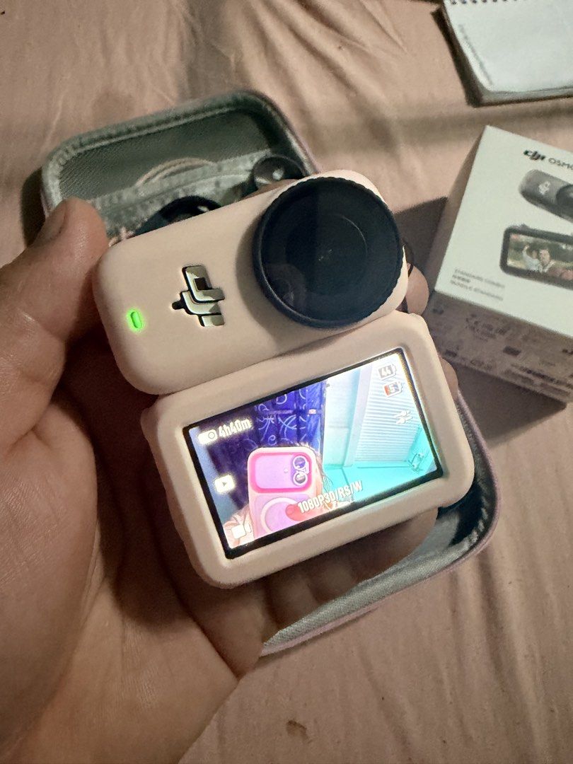 DJI Osmo Nano 128GB Standard Combo Action Camera (Category: Video Cameras) located in Cainta. Submitted by alisonolshoppe (Listing ID 1468155905, Image 2). Description: - Item: DJI Osmo Nano Standard Combo - Storage: 128GB - Color/Protection: Pink protective casing and pink carrying case included - Inclusions: Camera unit, touch screen display module, charging cable, lanyard mount, and protective frame - Documentation: Original retail box and Tik