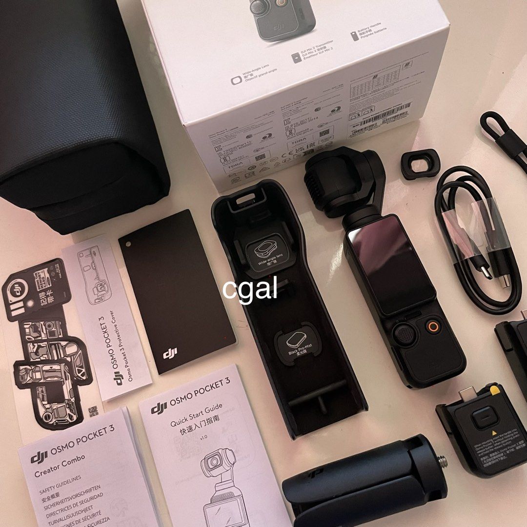 DJI Osmo Pocket 3 Creator Combo (Category: Cameras) located in Cavite. Submitted by cgal. (Listing ID 1468124799, Image 2). Description: - DJI Osmo Pocket 3 Creator Combo Set (except the microphone set) - Includes gimbal camera and protective cover - Comes with battery handle and mini tripod - Includes wide-angle lens - Complete with wrist strap, Type-C cable, and manuals - Original box included Condition: Like new / Well-maintained as in kakabil