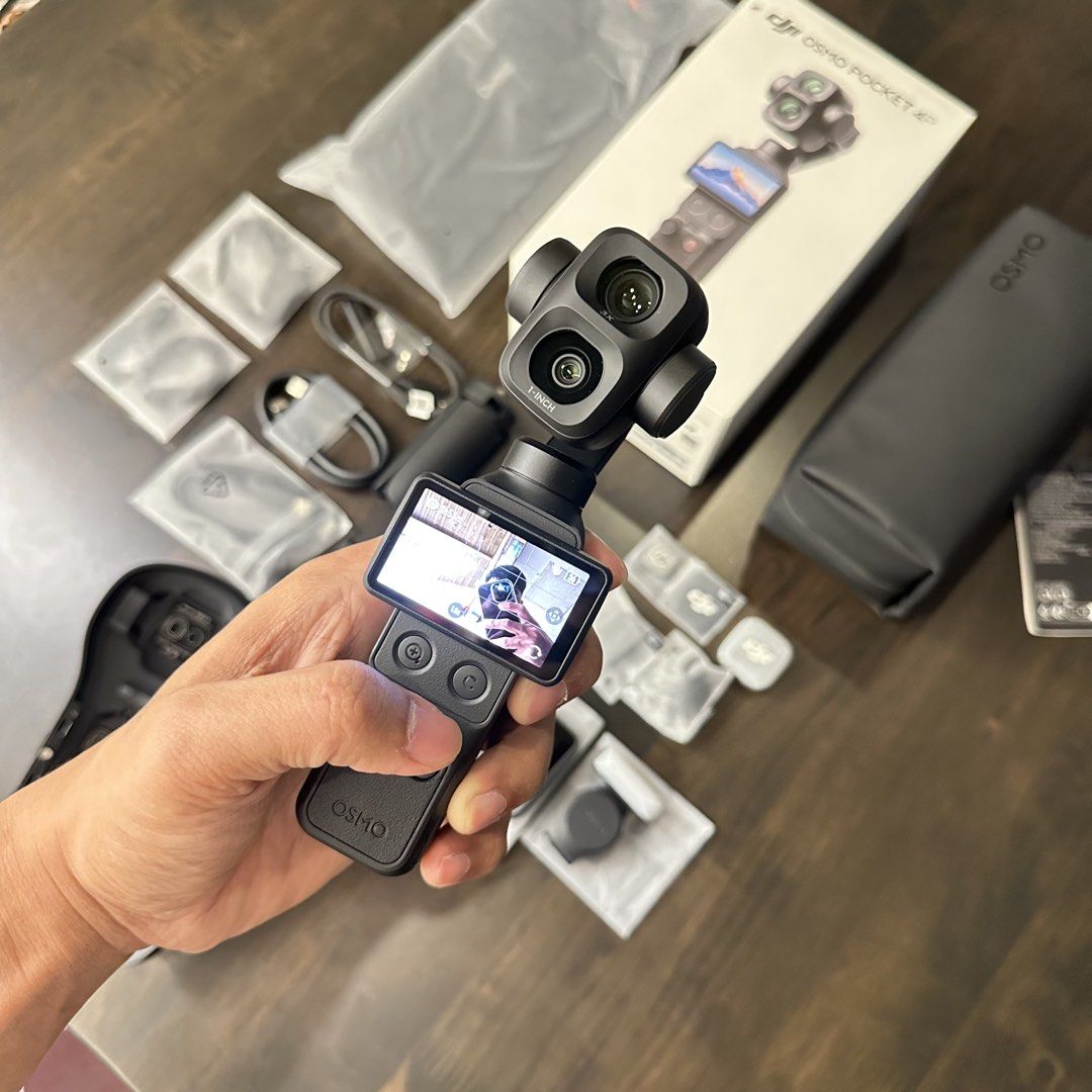 DJI Osmo Pocket 4P Vlog Combo (Category: Cameras) located in Caloocan City. Submitted by plukjohnmi28375 (Listing ID 1468224134, Image 2). Description: In mint condition, No Issue, Dents or Scratches. Complete Accessories💯 Date Purchased: September 9, 2026 only, wala pang 2 months Price: 37.5K Fixed Freebie: K&F Concept Protective Case PM for inquiry 📍Meet up around Alabang Muntinlupa.
