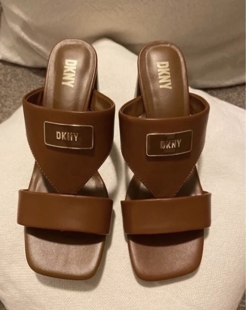DKNY Brown Block Heel Mules Sandals US 7M (Category: Flats & Sandals) located in Muntinlupa City. Submitted by hollieberrygirl (Listing ID 1468124708, Image 2). Description: DKNY Brown Slip-on Open Toe Sandals w/ Heels Store bought in Australia Size 7 w/ 3” heels Price - P5,995 SF c/o buyer Seller is not responsible for anything that happens to the item after purchase..